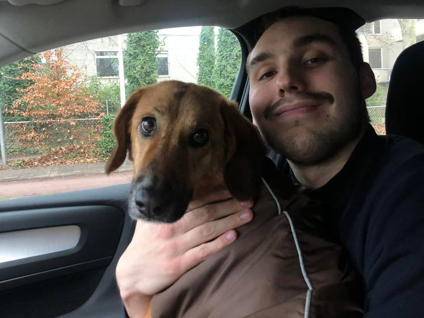Cameron Krutwig and Emmi, a dog he and his wife, Jess, fostered when he played in Belgium in 2022.