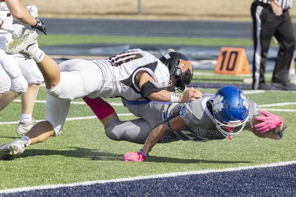 Photos: Newman beats up on Kewanee in Week 8 football