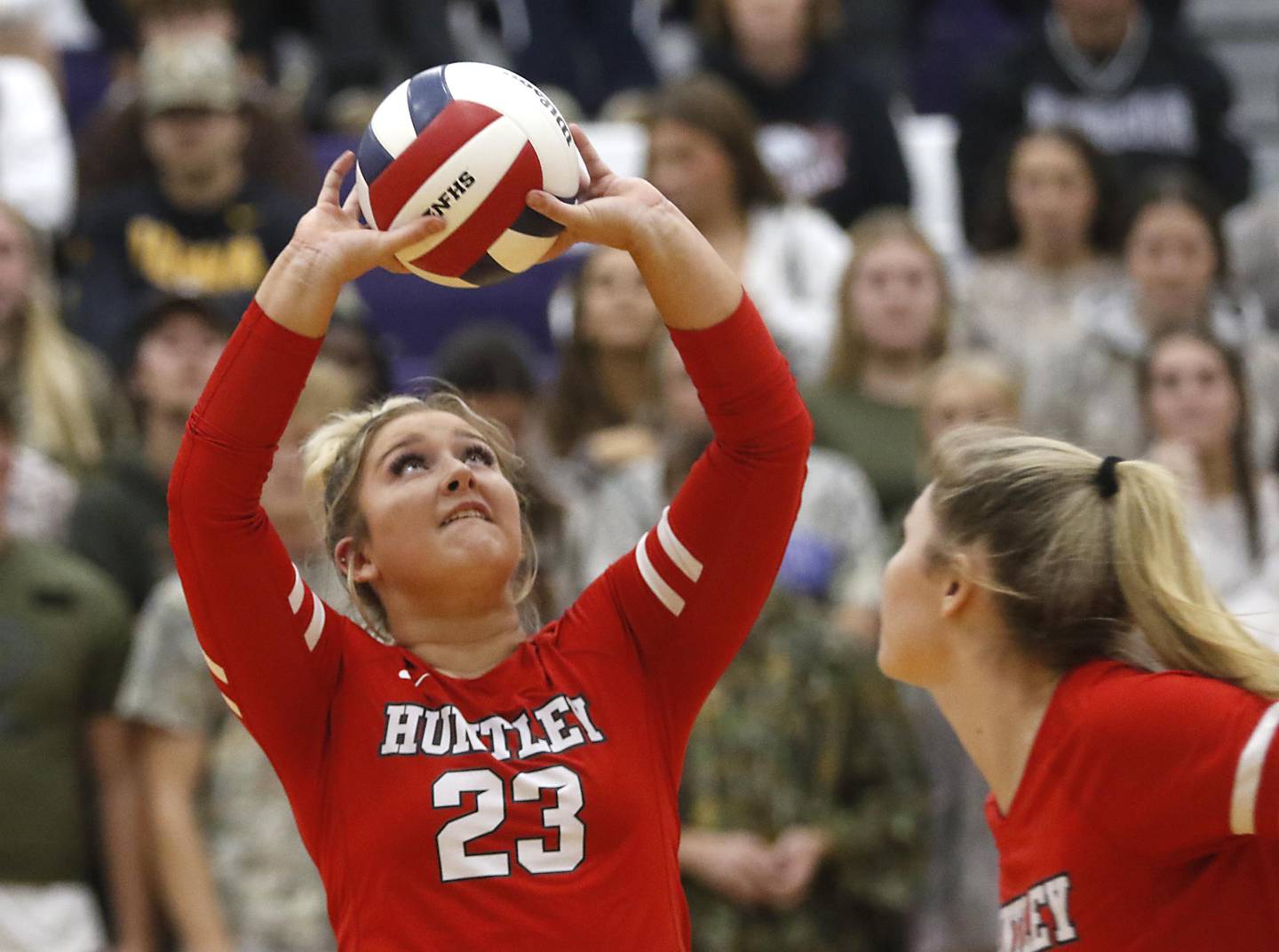 Huntley's Abby Whitehouse sets the bal during an IHSA Class 4A Hampshire Sectional semifinal volleyball match against Libertyville on Tuesday, Nov. 4, 2025, at Hampshire High School.