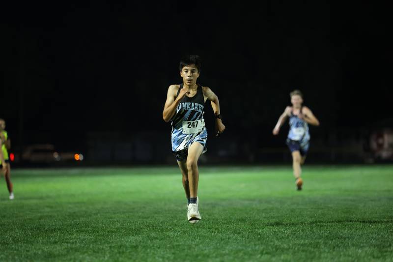 Kankakee's Emilio Barron runs during the All-City cross country meet at Bishop McNamara on Wednesday, Sept. 17, 2025.