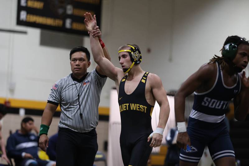 Joliet West’s Coehn Weber defeats Plainfield South’s Kayden Palmer in the 150 pound match on Wednesday, Dec. 3, 2025 in Joliet.