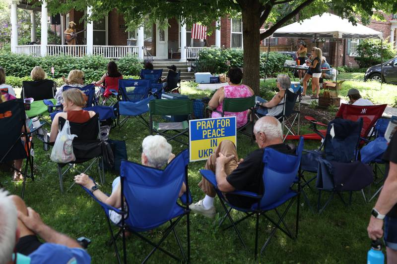 Music lovers pack the lawn along Western Avenue to listen to Any Jones perform. The Upper Bluff Historic District hosted Porch & Park Music Fest featuring a variety of musical artist at five different locations. Saturday, July 30, 2022 in Joliet.