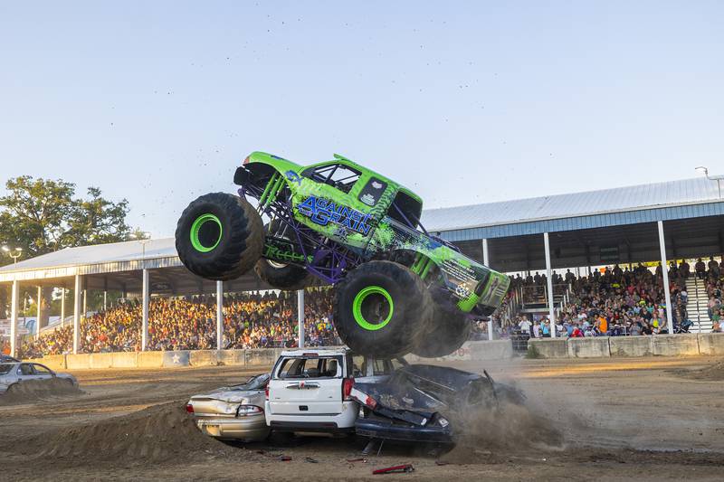 Brad Shippert of Dixon gets big air during the wheelie stand category Thursday, August 17, 2023 during the Full Throttle Monster Truck show at the Whiteside County Fair. The local boy made good by wowing the crowd in Morrison.