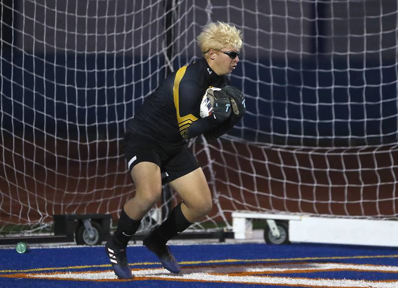 Crystal Lake South's Chris Slawek saves a shot on goal during the IHSA Class 2A state championship soccer match against Peoria Notre Dame on Saturday, Nov. 4, 2023, at Hoffman Estates High School.