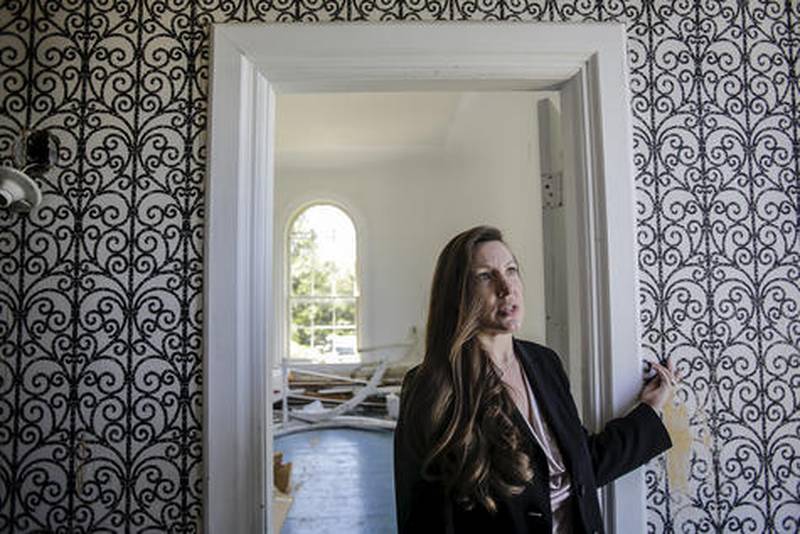 Stikney House Foundation president Nicole Horn talks Friday about preservation efforts at the historic Stickney House in Bull Valley. The house, which now acts as the village hall, was originally built between 1849 and 1856.