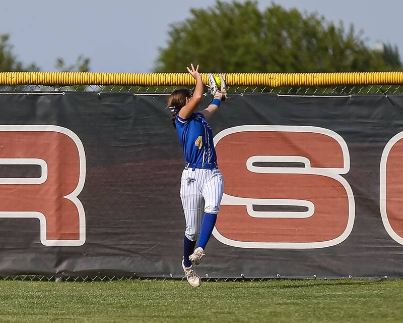 Wheaton North's Makayla Grantz (4) makes an outfield catch during Class 4A Plainfield North Sectional final softball game between Wheaton North at Oswego. May 31th, 2024.