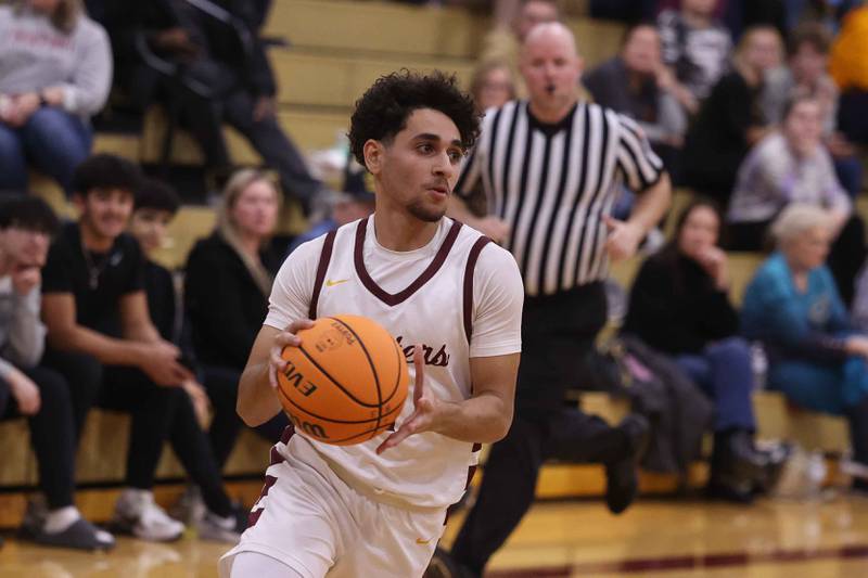Lockport’s Ramzy Barbarawi makes a move against Lincoln-Way West on Friday, Dec. 6, 2024 in Lockport.