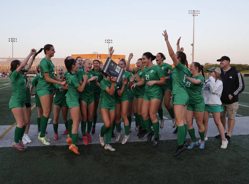 York celebrates winning the Class 3A Morton regional girls soccer final between Downers Grove South and York in Berwyn on Friday, May 17, 2024.