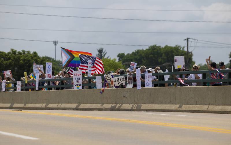 Protesters in Dixon join a nationwide No Kings protest Saturday, June 14, 2025. The anti-Trump gathering lined both sides of the Peoria Avenue Bridge.