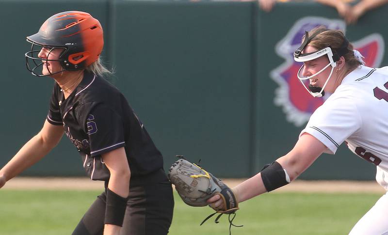Serena's Emily Hoffman gets tagged out in a run down by LeRoy's Morgan Fleming during the Class 1A Supersectional game on Monday, June 2, 2025 at Illinois Wesleyan Univesity in Bloomington.