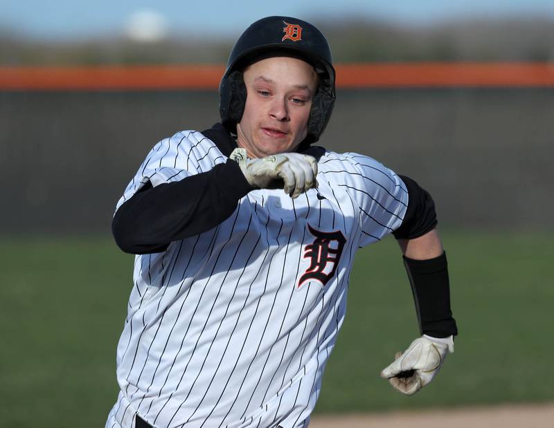 DeKalb's Ruari Bengford-Breneisen rounds third on his way to scoring a run Tuesday, April 15, 2025, during their game against Naperville North at DeKalb High School.