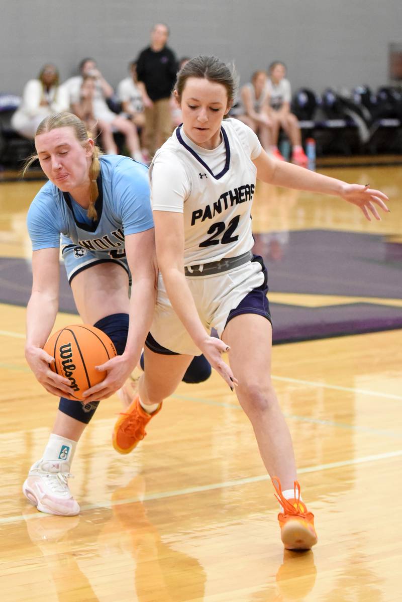 Cissna Park's Addison Lucht, left, steals a pass intended for Manteno's Sophie Peterson during a game at Manteno Monday, Jan. 19, 2026.