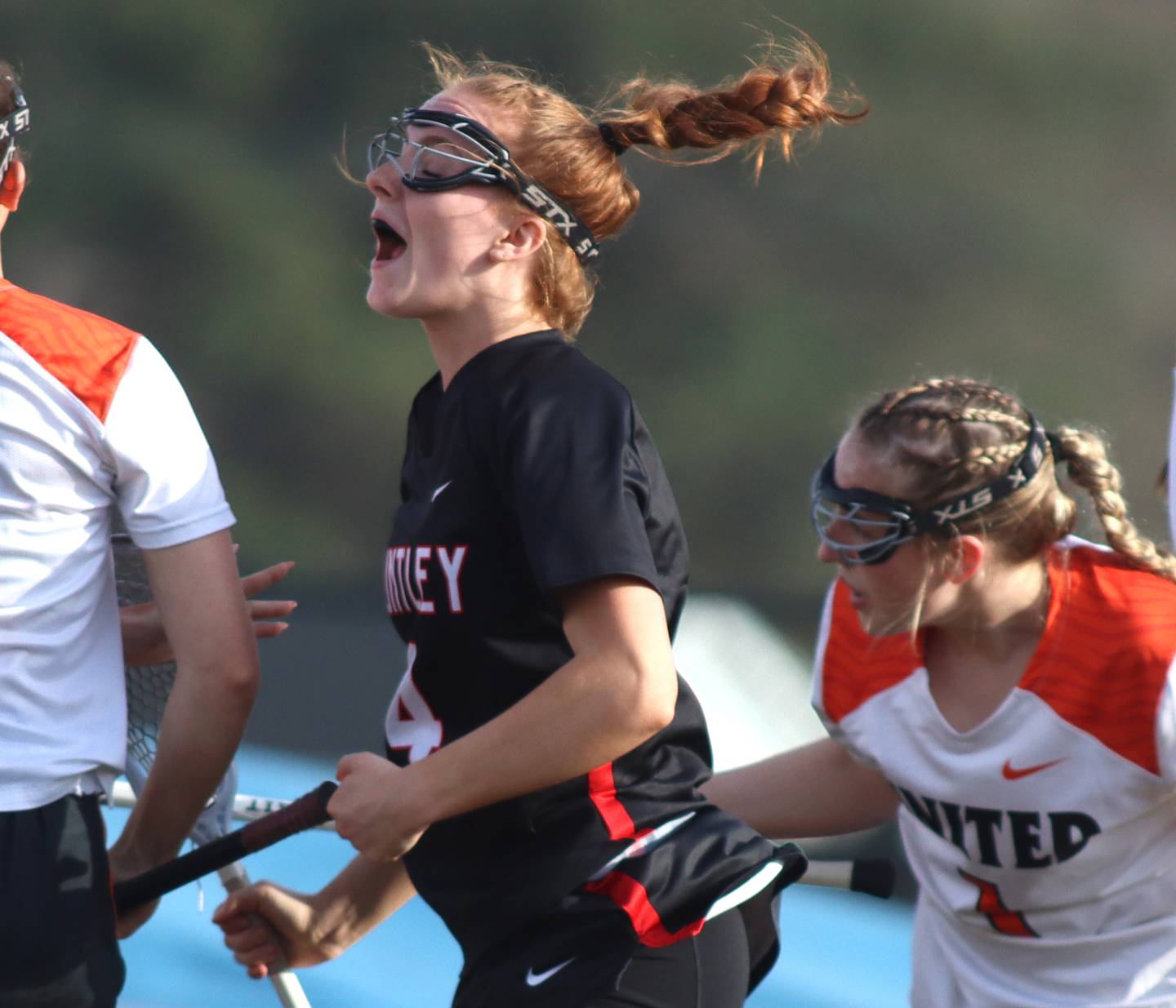 Huntley’s Mya Holmberg celebrates after scoring in varsity girls lacrosse on Friday, April 18, 2025, at Metcalf Field on the campus of Crystal Lake Central High School in Crystal Lake.