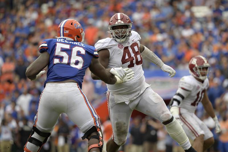 Alabama defensive lineman Phidarian Mathis works against Florida offensive lineman Jean Delance on Sept. 18, 2021 in Gainesville, Fla.