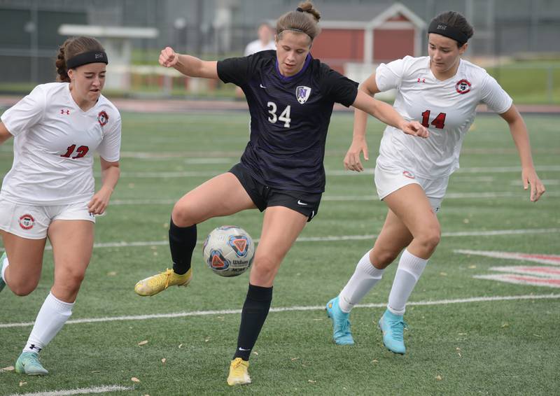 Downers Grove North's Lexi Keown defends the ball  during the regional final game against Glenbard East Friday May 20, 2022.