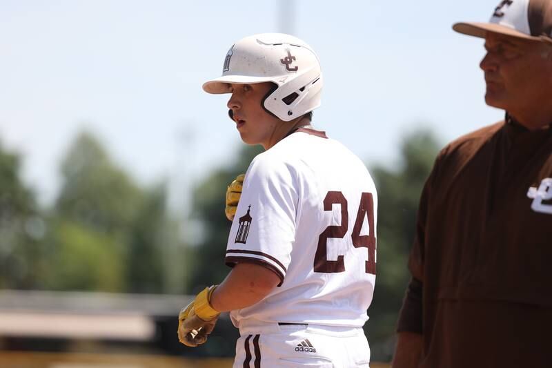 Joliet Catholic’s Vinnie Spotofora stands on first base after an error against Spring Valley Hall in the Class 2A Geneseo Supersectional on Monday, May 29, 2023 in Geneseo.