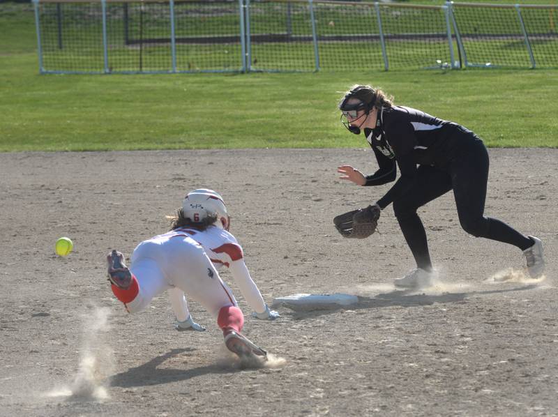 Oregon's Ella Dannhorn slides toward second base as Rock Falls' Julia Renner looks to field the throw on Monday, April 14, 2025 at a game at Oregon Park West.