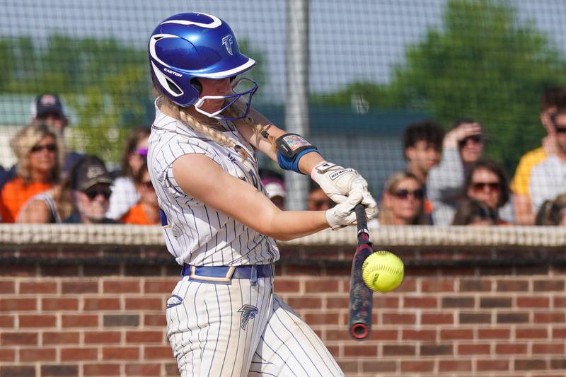 Wheaton North's Makayla Hammer (11) connects on a pitch against Oswego during a Class 4A Oswego Sectional Final game at Oswego High School on Friday, June 6, 2025.
