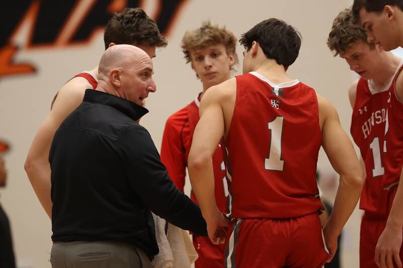 Hinsdale Central head coach Nick Latorre talks to his team before the game against Lincoln-Way East in the Lincoln-Way West Warrior Showdown on Saturday January 28th, 2023.