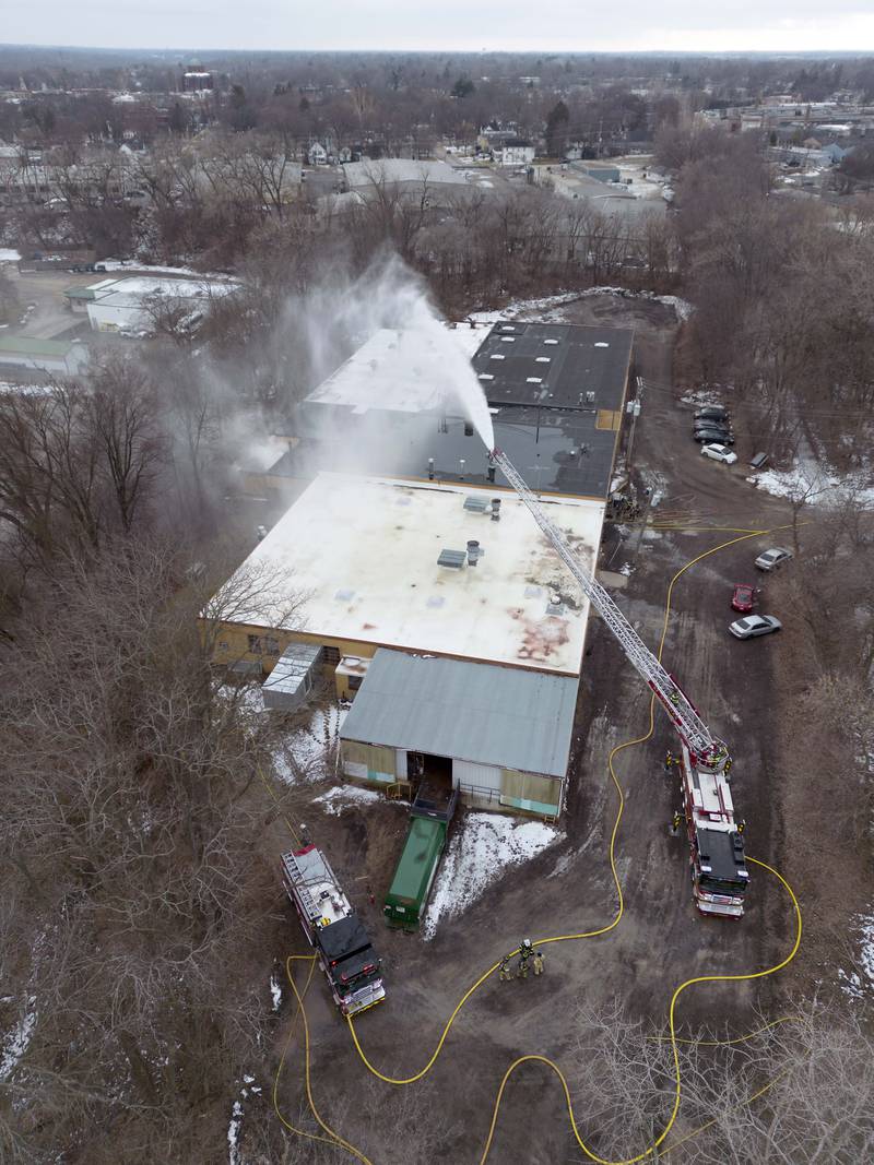 Area crews work to control a fire and hazmat response in the 400 block of Union Street Tuesday February 7, 2023 in Geneva.