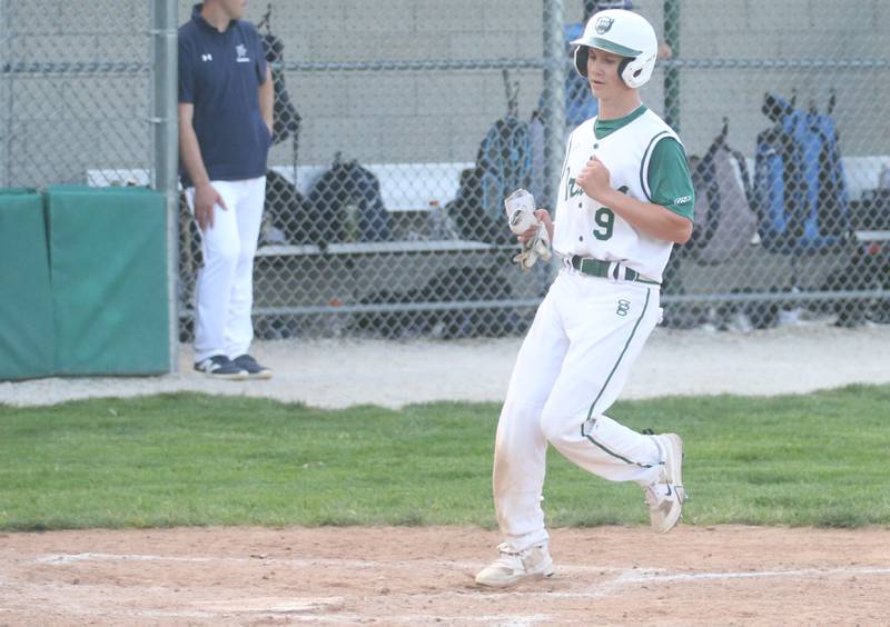 St. Bede's Geno Dinges crosses home plate to score a run against Bureau Valley on Wednesday, May 14, 2025 at St. Bede Academy.