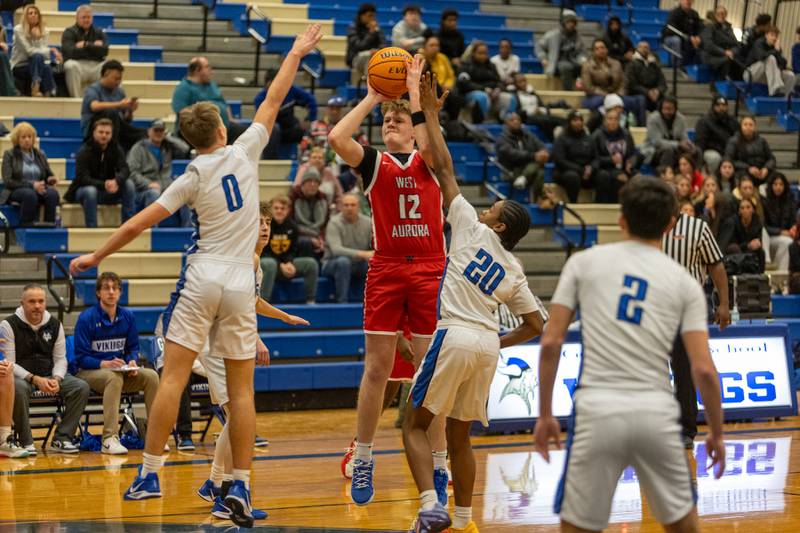 West Aurora's Drew Lundberg shoots a jumper against Geneva on Monday, Jan. 19,2026 in Geneva.