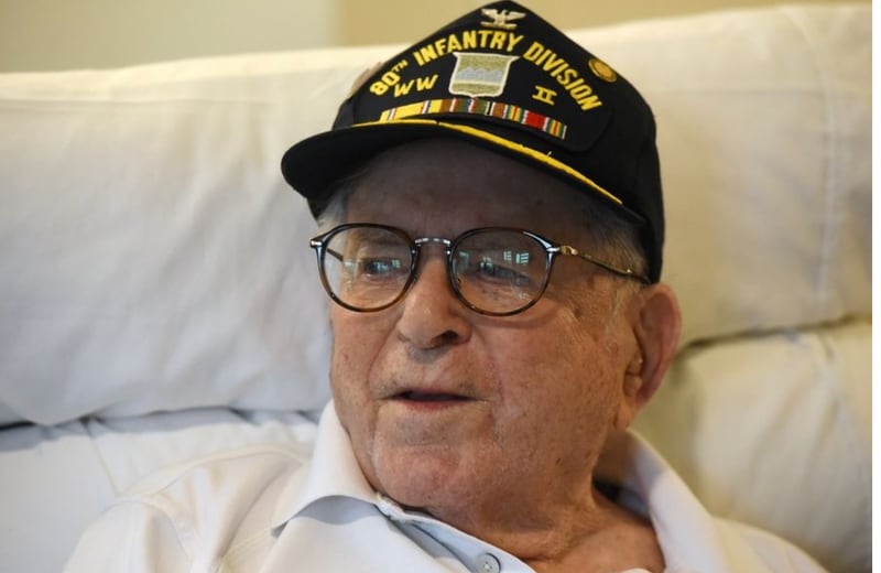 World War II veteran Lionel Rothbard, who turns 102 on March 22, talks about his time in the service. (Joe Lewnard | Staff Photographer)