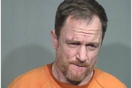 Lake County felon who hid gun in squad car during McHenry traffic stop guilty of weapon, drug charges