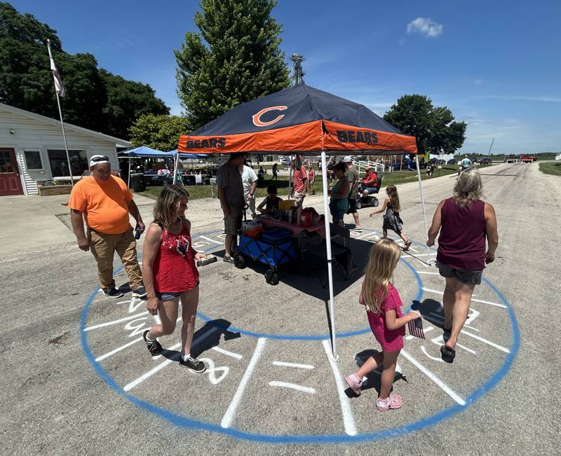 People take part in the Hooppole Fun Day's Cake Walk on Saturday, June 28, 2025 in Hooppole.