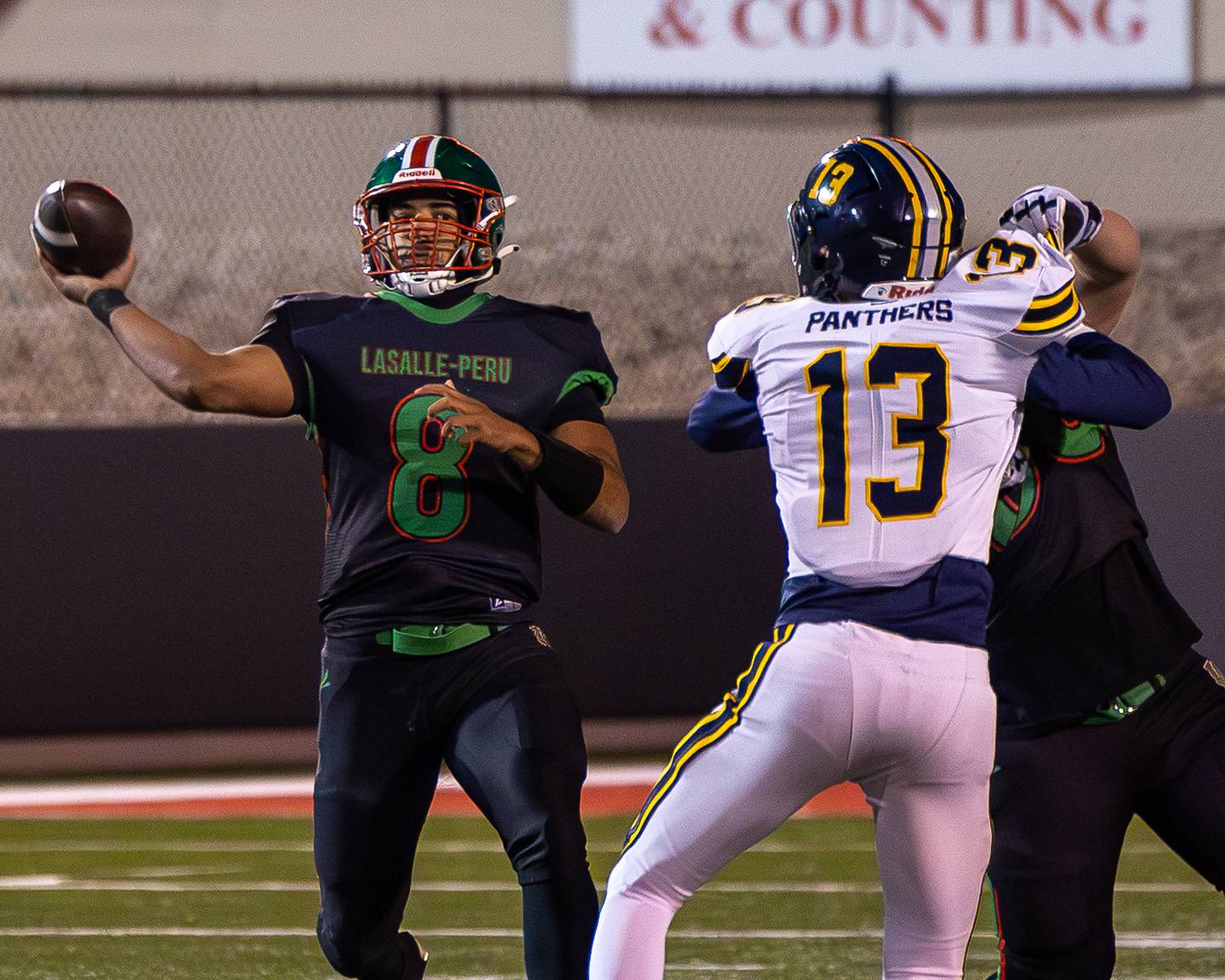 Marion Persich (8) of L-P throws ball to receiver on Friday, October 24, 2025 at Howard Fellows Stadium in LaSalle.