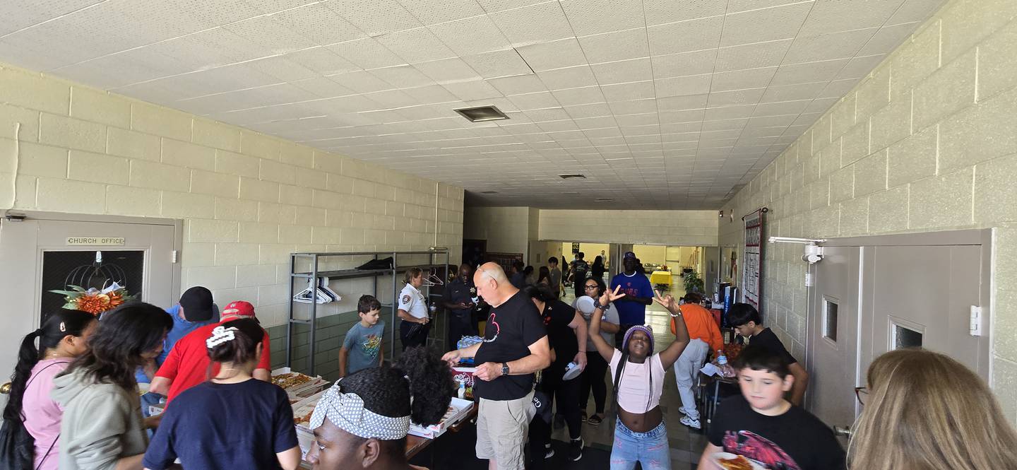 Volunteers for the fall 2025 Bicentennial Bluffs Neighborhood Association neighborhood enjoy a "thank you, lunch" after their hard work. Volunteers are needed for the spring event, which will take place Saturday, May 2, 2026.