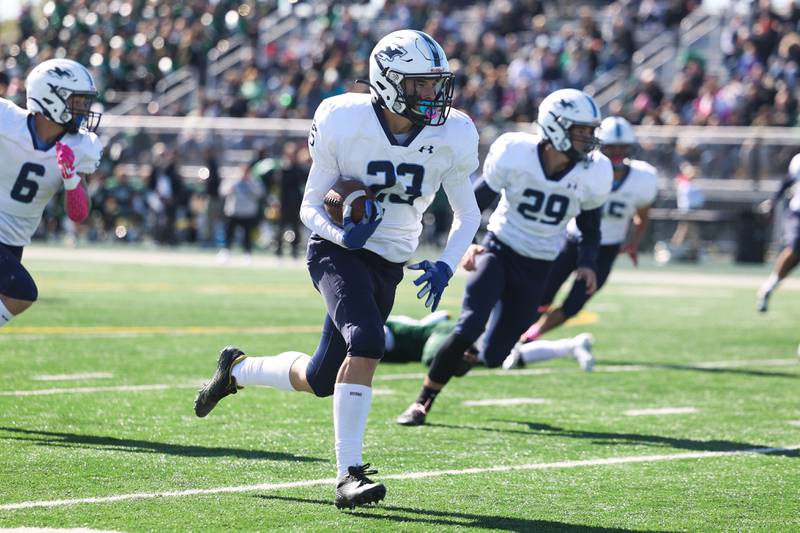 Plainfield South’s Jacob Russell returns an interception for a touchdown against Plainfield Central. Saturday, Oct. 8, 2022, in Plainfield.