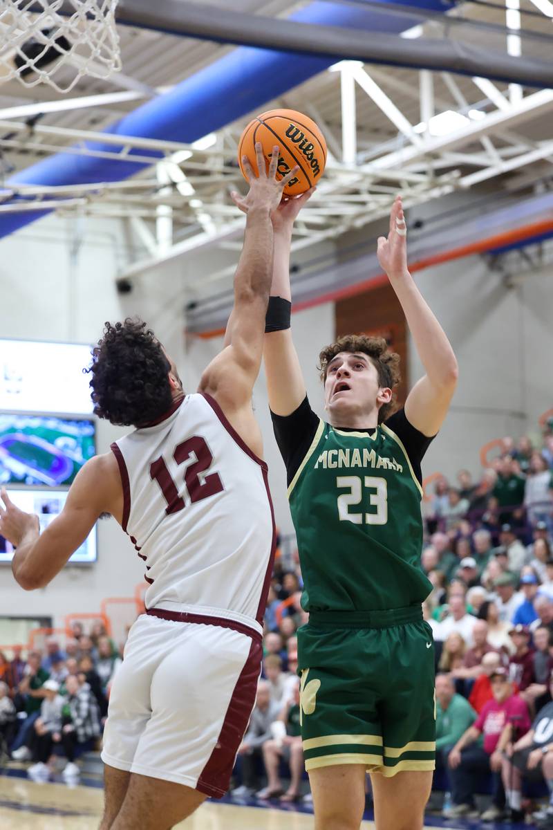 Bishop McNamara's Karter Krutsinger shoots under pressure during the Fightin' Irish's 77-70 loss to Tolono Unity in the IHSA Class 2A Pontiac Supersectional on Monday, March 9, 2026.
