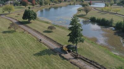 Photos: New 10-foot path replaces old walkway around Baker Lake in Peru