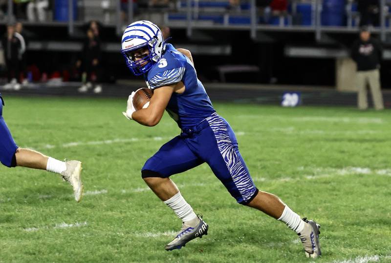 Princeton's Ace Christiansen takes off on a 47-yard "Pick 6" in the Tigers' 41-0 Homecoming win over rival Hall on Friday, Oct. 4 at Bryant Field.