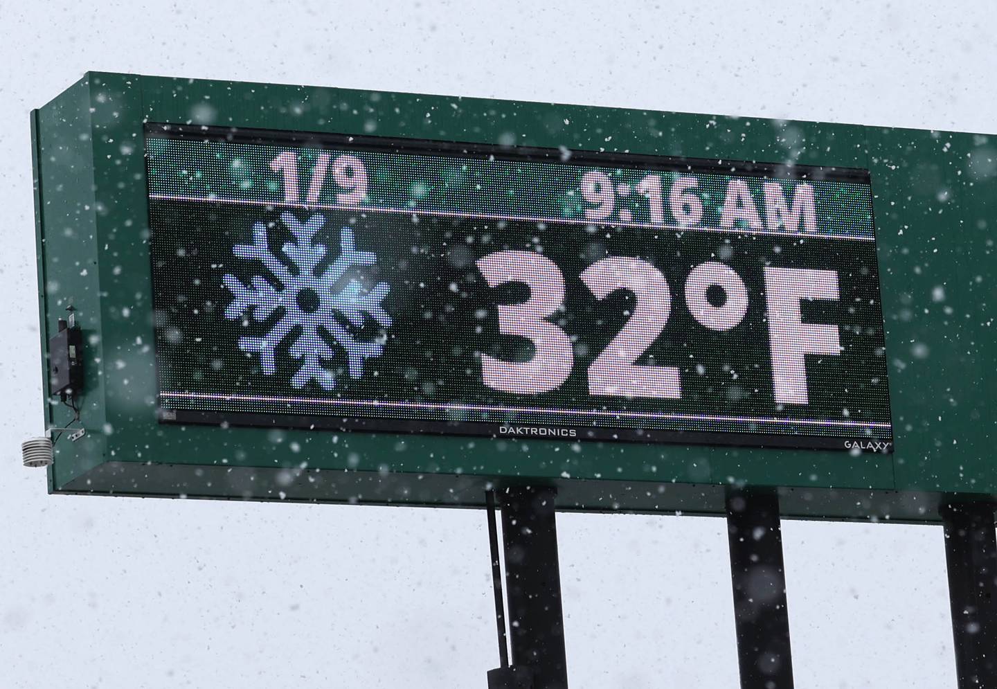 The sign at the First Nation Bank tells it all as temperatures are just cold enough to make the precipitation snow rather than rain Tuesday, Jan. 9, 2024, in DeKalb. Snow is expected to continue throughout the day with 7 to 10 inches of snow expected.
