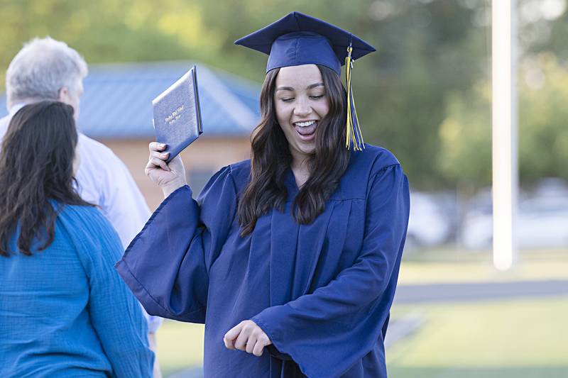 Mallory Osborn celebrates her diploma from Sterling High School Friday, May 26, 2023.