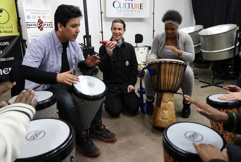 Therapeutic school students, studio use steelpan drumming class to bring about positive change