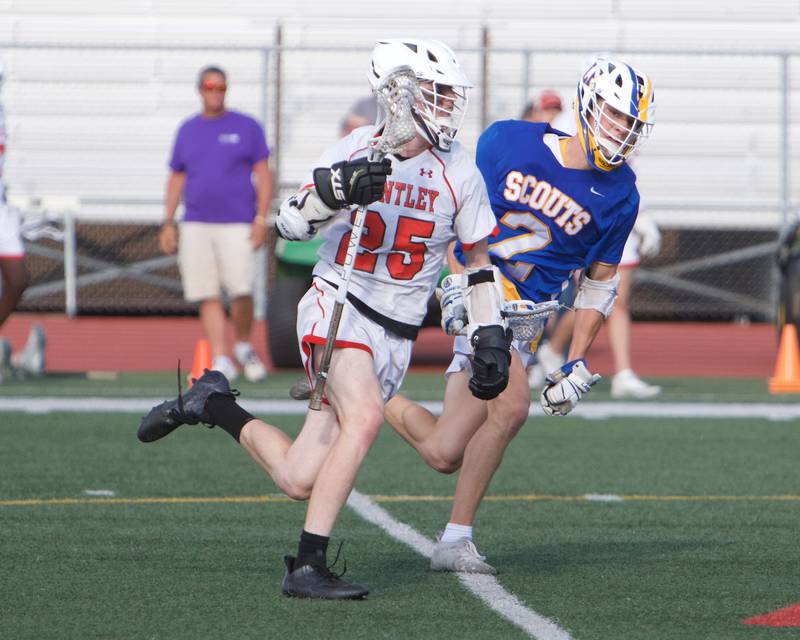 Huntley's Josh Witt looks to advance against Lake Forest's Dennis Hickey at the Super Sectional Final on Tuesday, May 30, 2023 in Huntley.