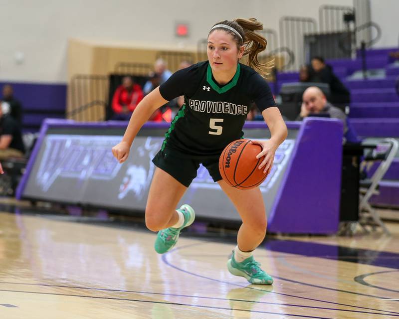 Providence's Sydney Spencer (5) drives baseline in the WJOL Tournament Championship game. Nov 18, 2023.