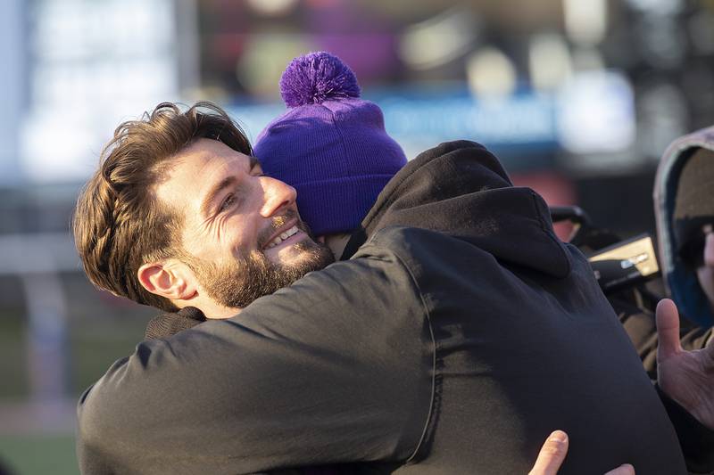 Chicago Christian head coach CJ Cesario is congratulated after his Knights beat Maroa-Forsyth 47-0 Friday, Nov. 29, 2024, in the class 2A football state final.