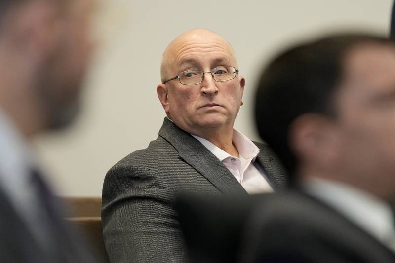 Robert E. Crimo Jr., father of Robert Crimo III, waits for court to begin before Judge George D. Strickland at the Lake County, Ill., Courthouse Thursday, Jan. 26, 2023, in Waukegan. Crimo Jr. faces seven counts of felony reckless conduct for signing the application for his son's firearm owners ID card in December of 2019.