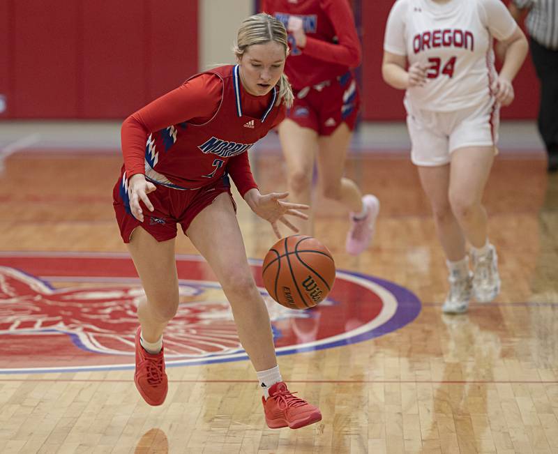 Morrison’s Kaylee Pruis tries to wrangle a loose ball Wednesday, Jan. 17, 2024 at Oregon High School.