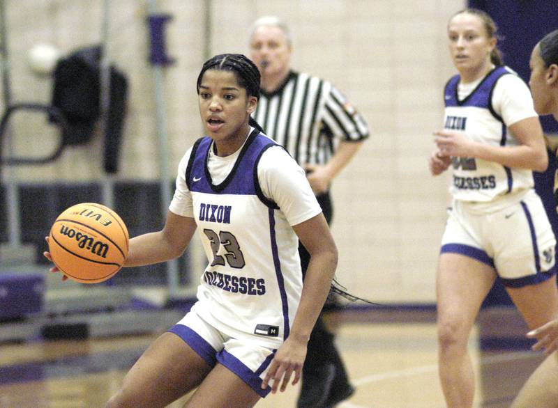 Dixon player Ahmyrie McGowan   brings the ball upcourt against Sterling.  Dixon and Sterling girls basketball teams played the 3rd place game of the Dixon Girls KSB Holiday Basketball Classic Saturday, Dec. 28, 2024