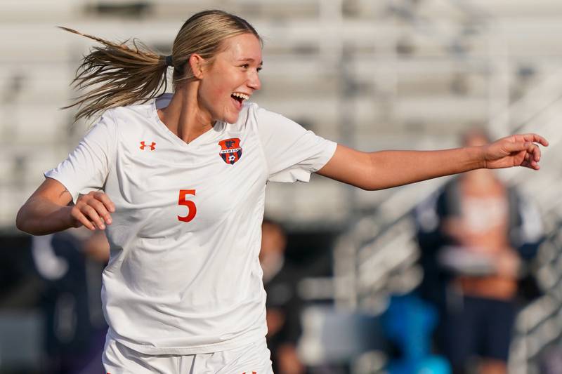 Oswego’s Aubrey Eirich (5) smiles after scoring a goal against Bartlett during a soccer mach in the Plainfield Classic at Plainfield North High School on Tuesday, April 15, 2025.