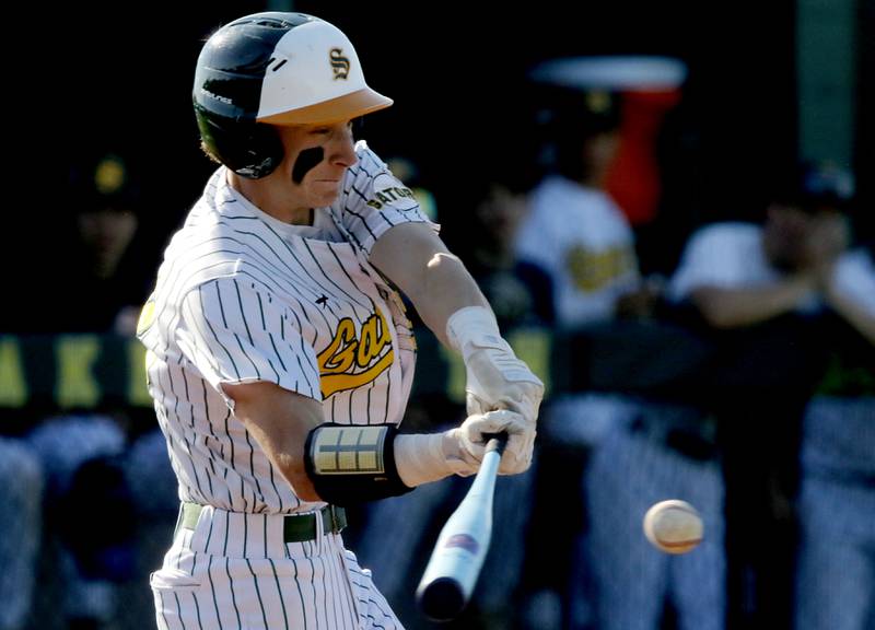 Crystal Lake South's Carson Trivellini hits the ball to score two runs during a Fox Valley Conference baseball game against Prairie Ridge on Friday, May 15, 2026, at Crystal Lake South High School.