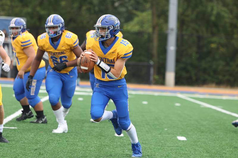 Joliet Central’s Caleb Christos scrambles to the outside against Joliet West on Saturday, Sept. 28, 2024 in Joliet.