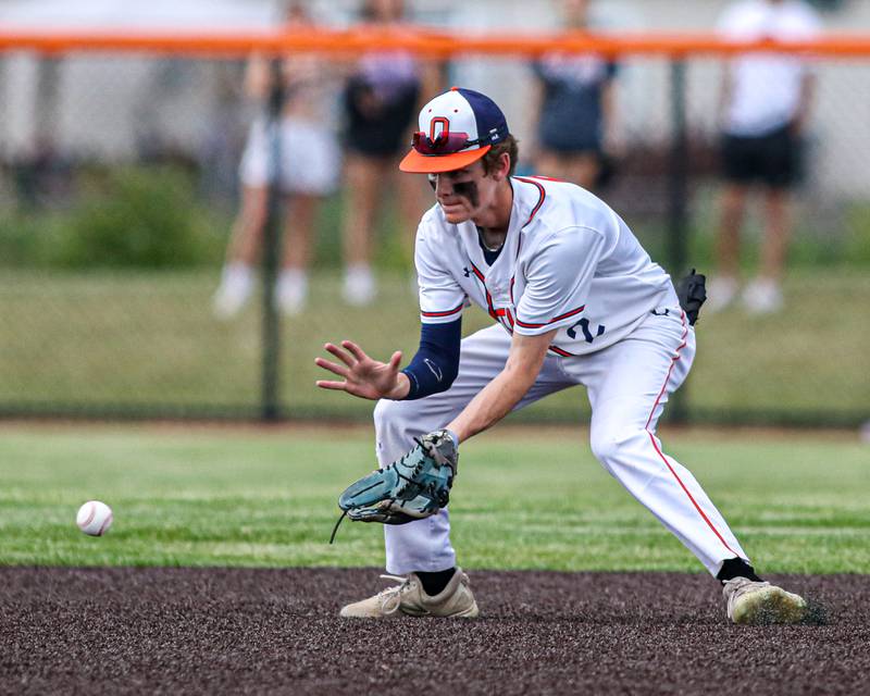 Oswego's Chase Gerwig (2) fields a grounder during Class 4A Romeoville Sectional semifinal game between Plainfield North at Oswego.  June 1, 2023.