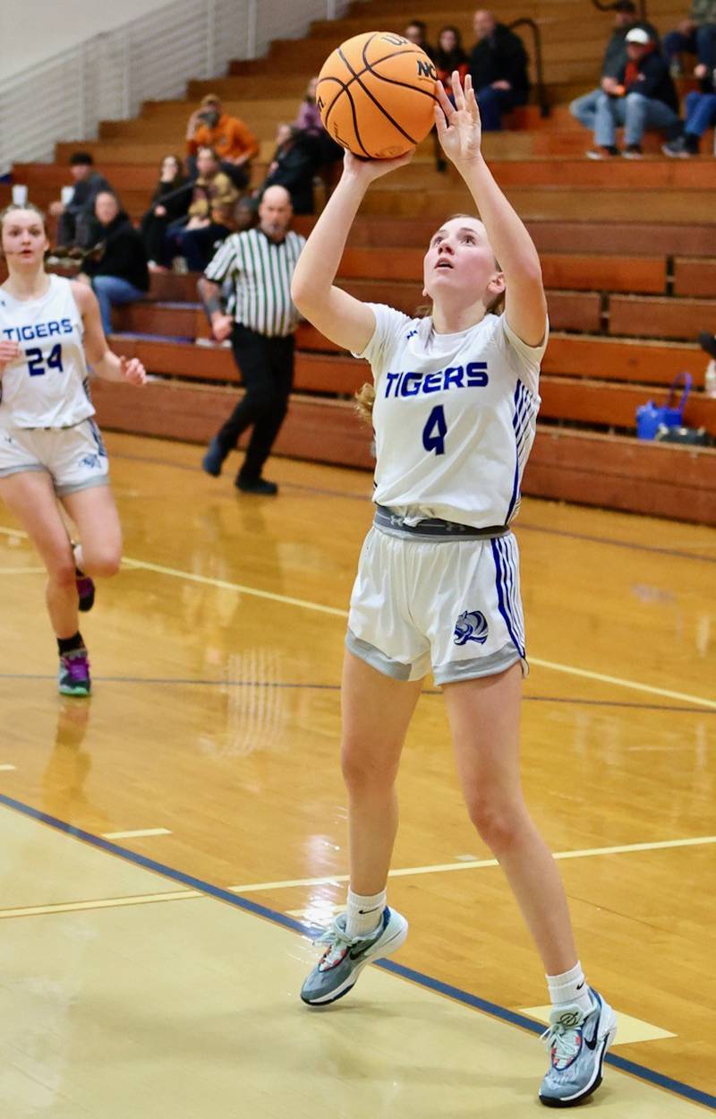 Princeton's Paige Jesse shoots against Sandwich in regional semifinal play Tuesday at Prouty Gym. The Tigresses won 50-35.