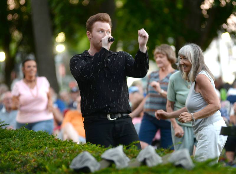 Jonny Lyons interacts with the crowd as he sings with his band the Pride at the Mt Morris Jamboree on Friday, June 27, 2025.